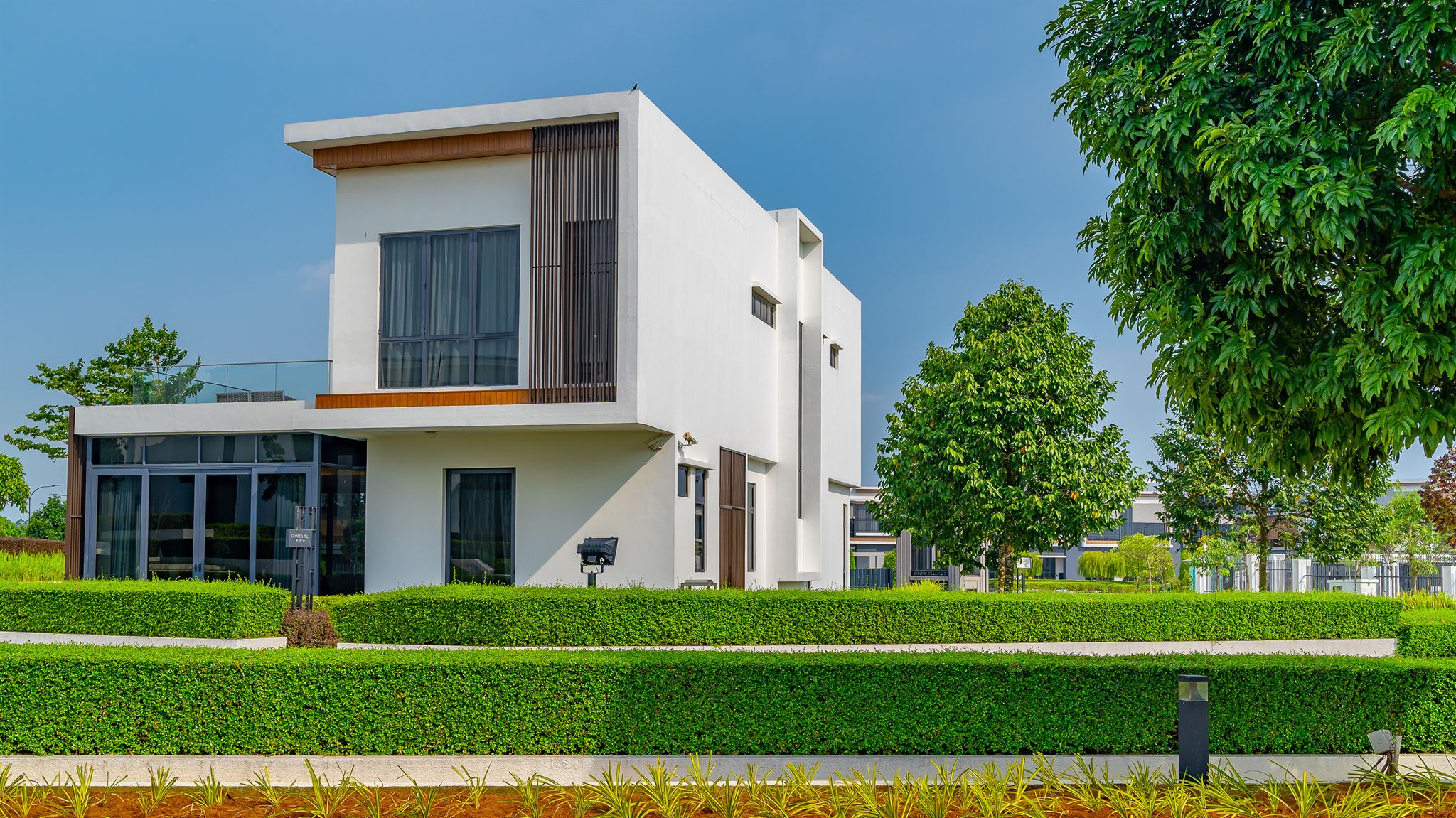 Modern house with green lawn